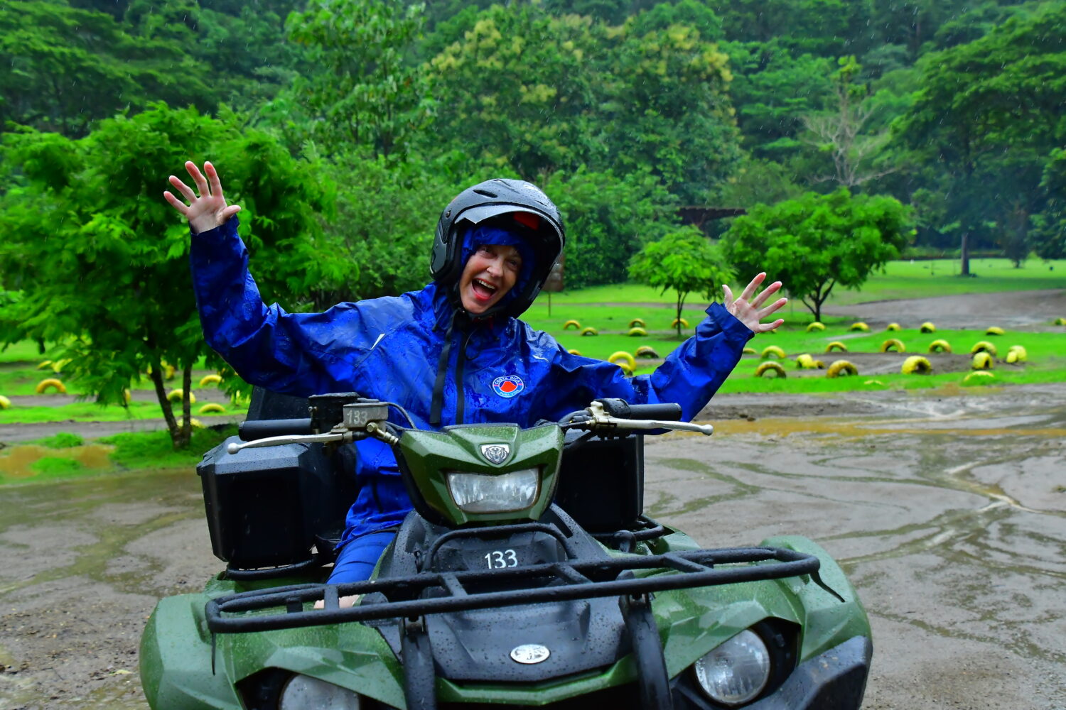 ATV rider on a jungle trail near Vista Los Sueños