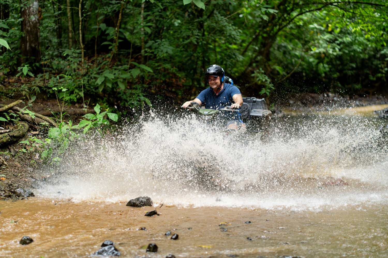 Guests enjoying the zipline and ATV waterfalls combo at Vista Los Sueños