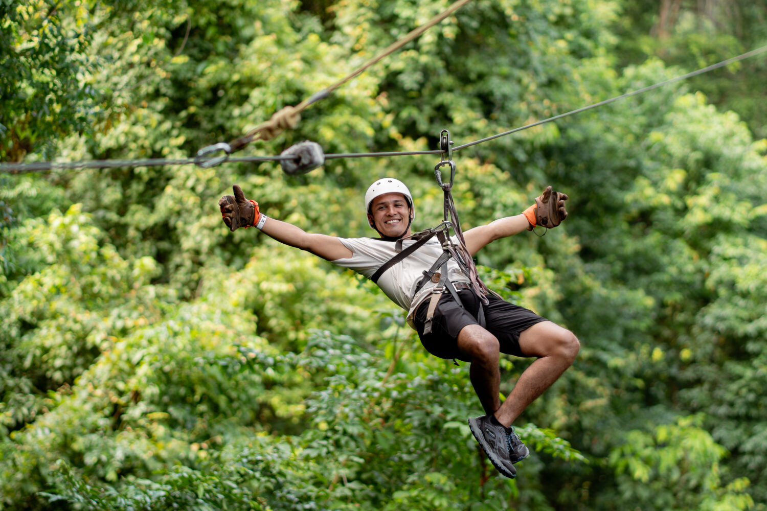 Guests combining zipline and horseback riding to a natural pool at Vista Los Sueños